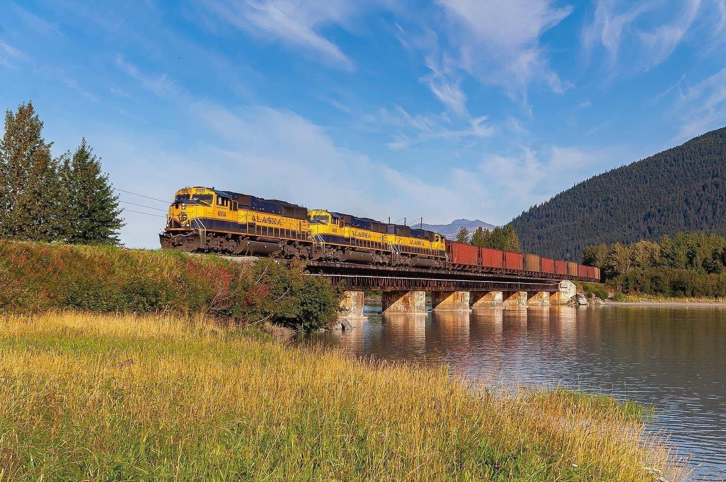 Southbound coal train crosses TwentyMile River on a beautiful morning.